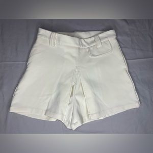 Day off-white high waisted shorts. Flaps on front & very cute & unique!